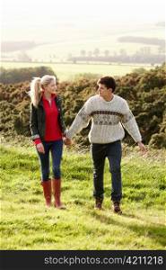 Young couple on country walk