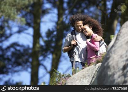 Young Couple On Hike In Countryside