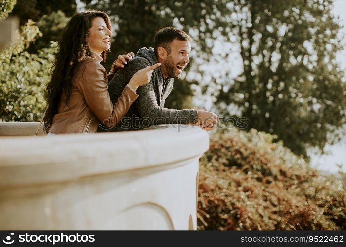 Young couple on outdoor balcony