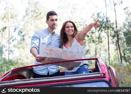 Young couple on roadtrip through countryside