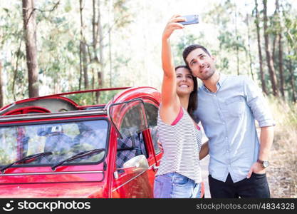 Young couple on roadtrip through countryside