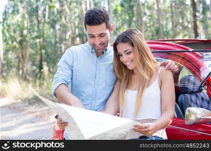 Young couple on roadtrip through countryside