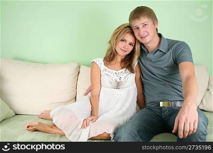young couple on sofa