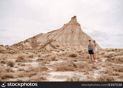 Young couple on the Barcenas Reales desert in Navarra, Spain