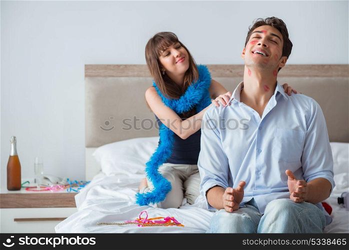 Young couple partying in the bed