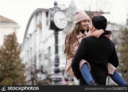 young couple piggy back ride 13