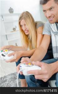 Young couple playing a video game