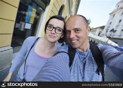 young couple portrait in love have romantic time on summer vacation holidays. selfportrait urban street scene