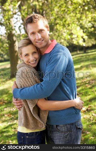 Young couple posing in park