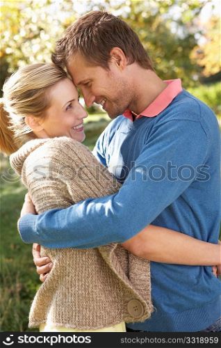 Young couple posing in park