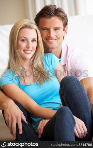 Young couple posing indoors