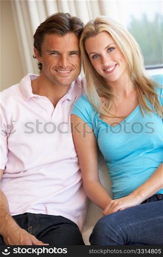 Young couple posing indoors