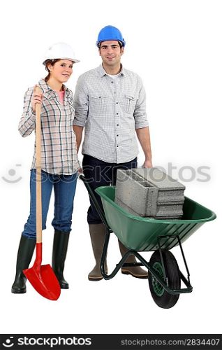 Young couple ready for construction works