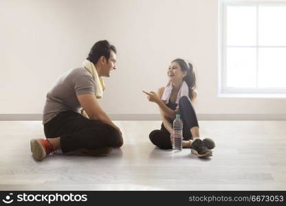 Young couple relaxing after workout