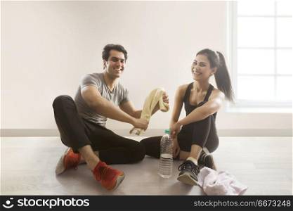 Young couple relaxing after workout