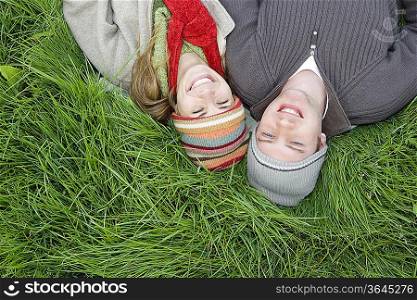 Young Couple Relaxing in the Grass