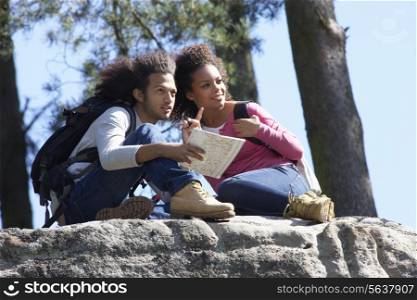 Young Couple Resting During Countryside Hike