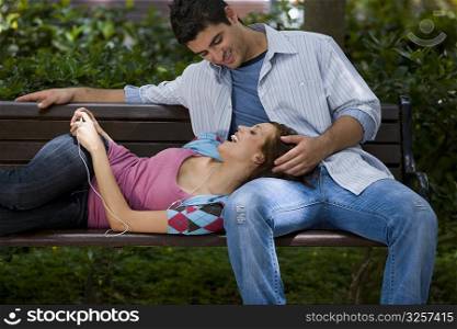 Young couple romancing in a park