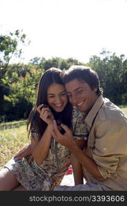 Young couple sharing fresh fruit