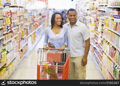 Young couple shopping at a grocery store
