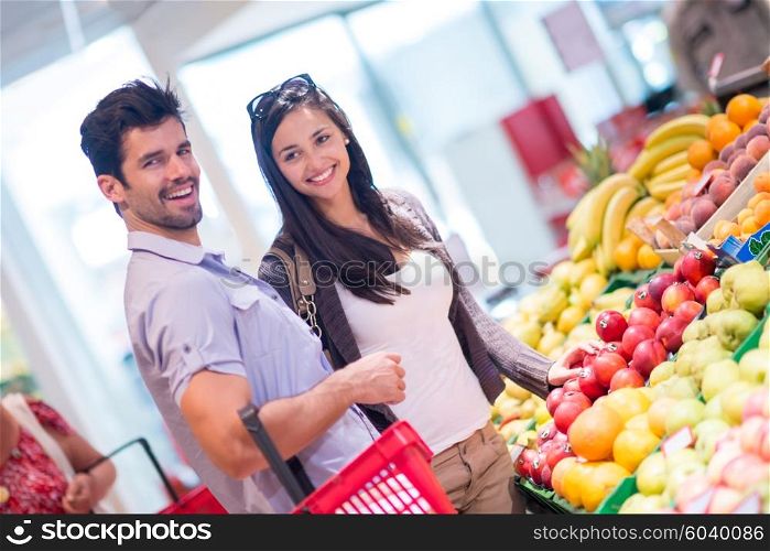 Young couple shopping in a supermarket