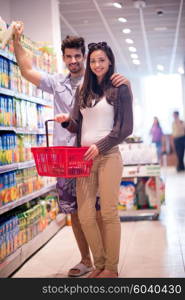 Young couple shopping in a supermarket