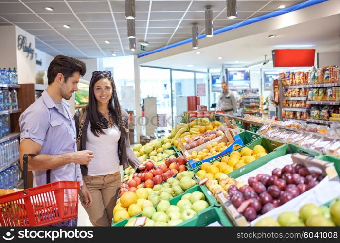 Young couple shopping in a supermarket