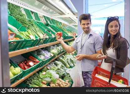 Young couple shopping in a supermarket