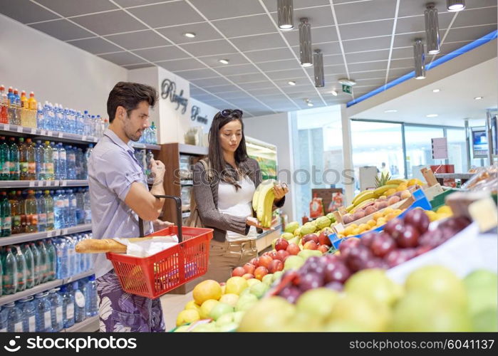 Young couple shopping in a supermarket