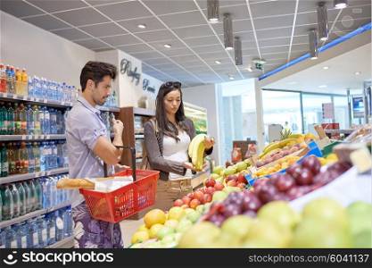 Young couple shopping in a supermarket