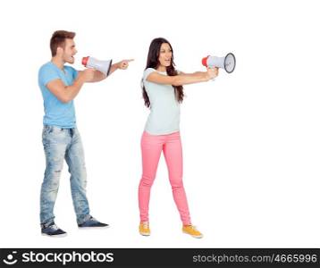 Young couple shouting with megaphones isolated on white