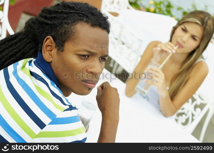 Young couple sitting at a table