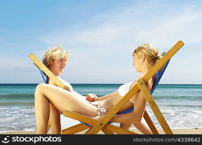 Young couple sitting in sun