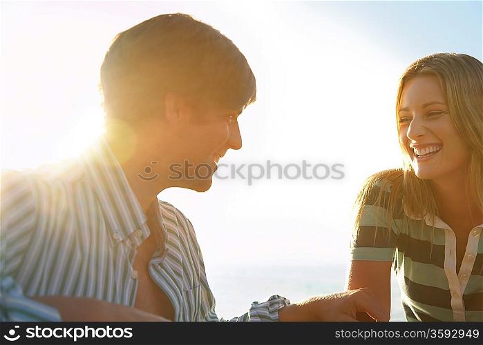 Young couple smiling head and shoulders