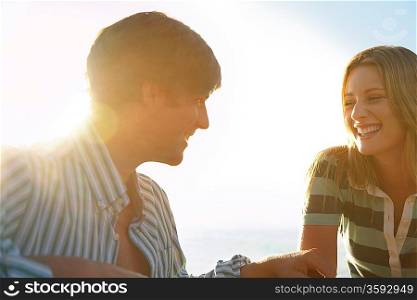 Young couple smiling head and shoulders