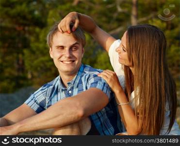 Young couple spend time together on outdoor, beautiful evening