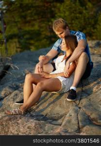 Young couple spend time together on outdoor, beautiful evening