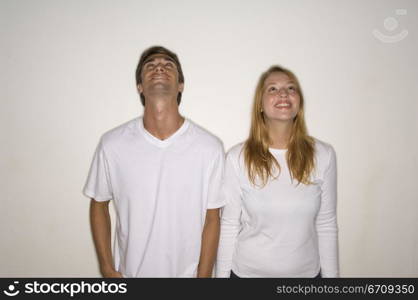 Young couple standing together and smiling