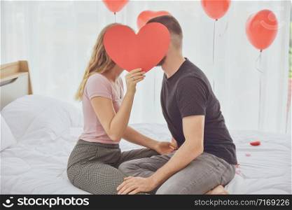 Young Couple sweet love in bed room morning soft focus