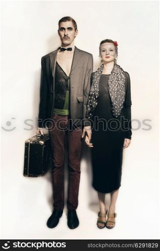 Young couple theater actors in a retro style on a white background. Vintage