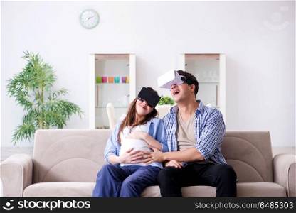 Young couple trying virtual reality glasses goggles
