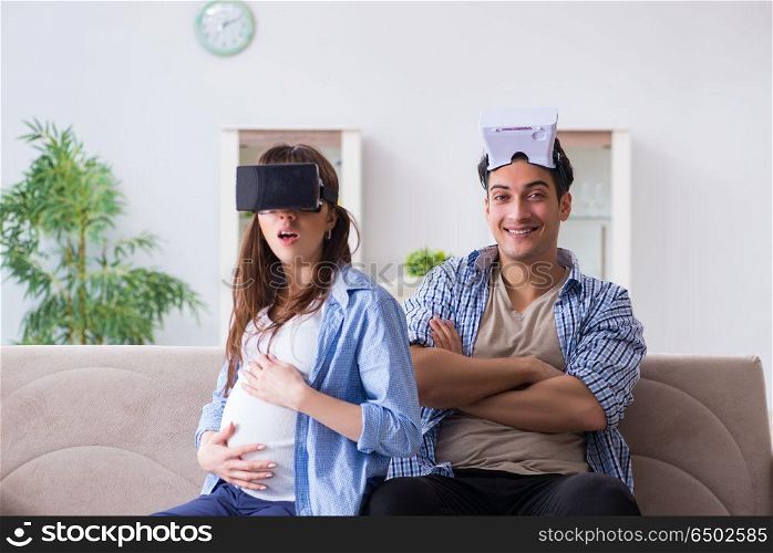 Young couple trying virtual reality glasses goggles