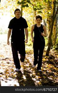 Young couple walking in a park