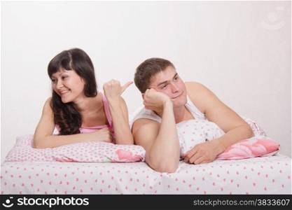 Young couple with a rest after work in bed