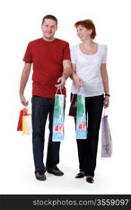 young couple with shopping bags on white background