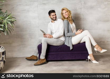 Young couple with tablet