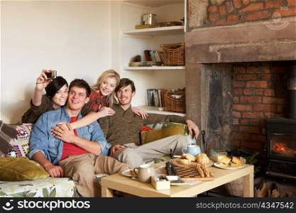 Young couples in cosy cottage