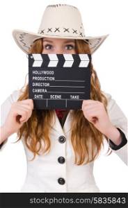 Young cowgirl with movie board isolated on white