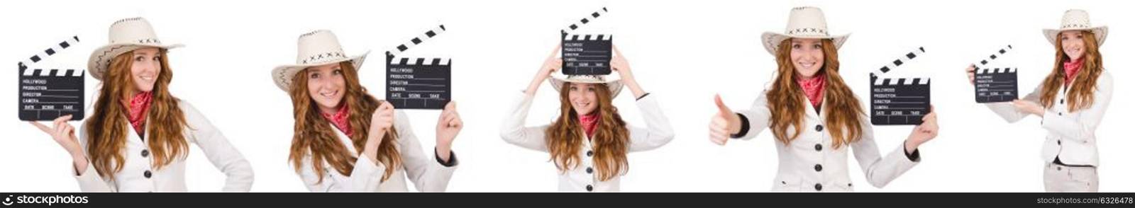 Young cowgirl with movie board isolated on white