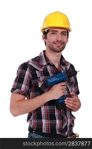 young craftsman holding a drill